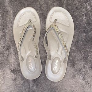 Brand new rubber Sketchers flip flops.
